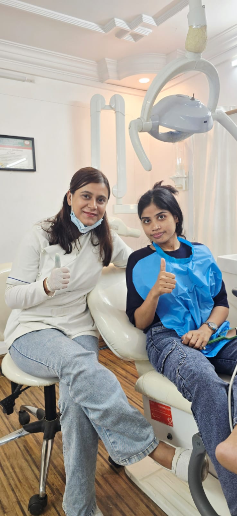 Dr. Sakshi Upadhyay consulting a happy patient